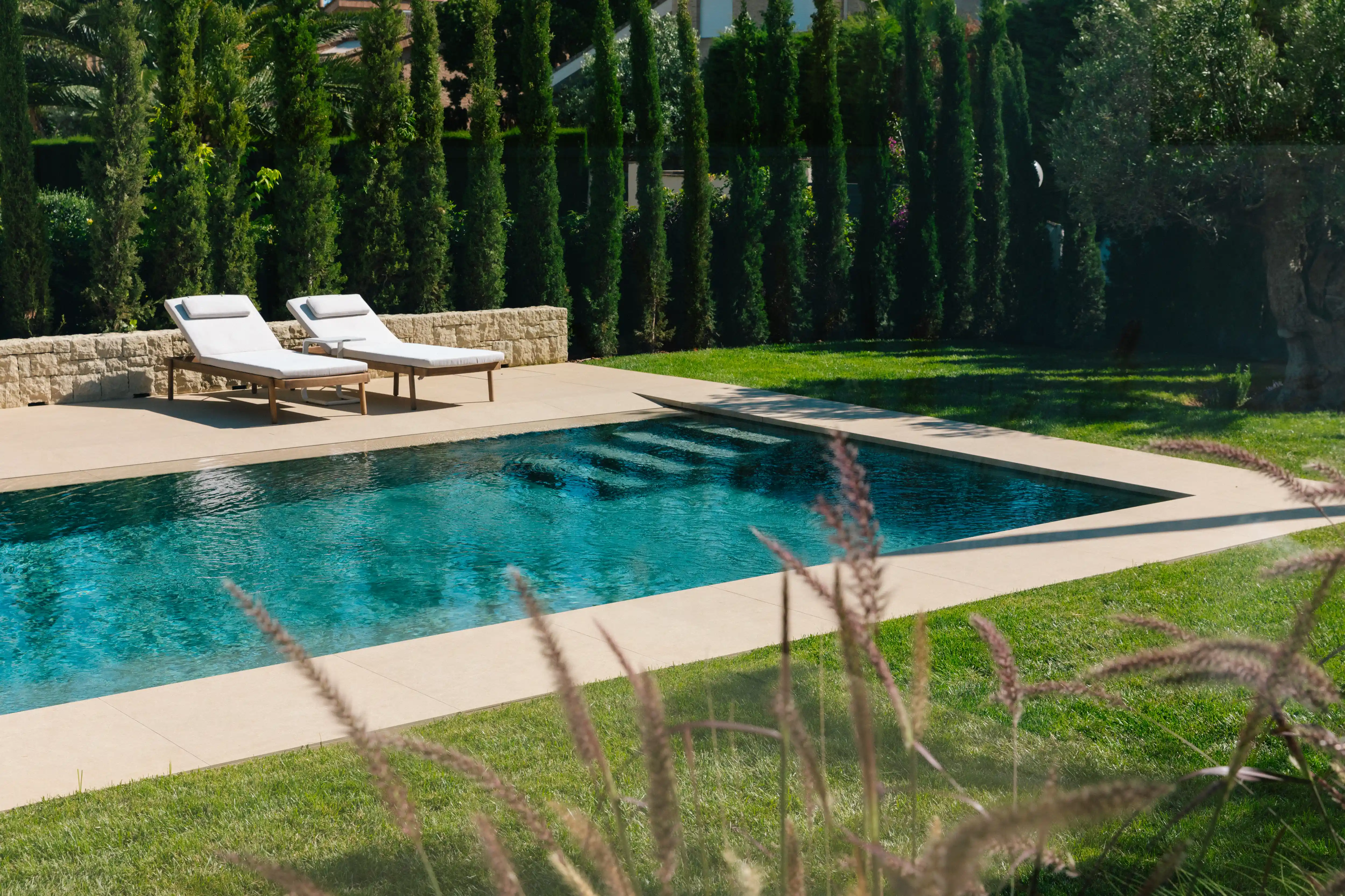 Outdoor terrace and pool area after rénovation de villa in Campolivar Valence image 76