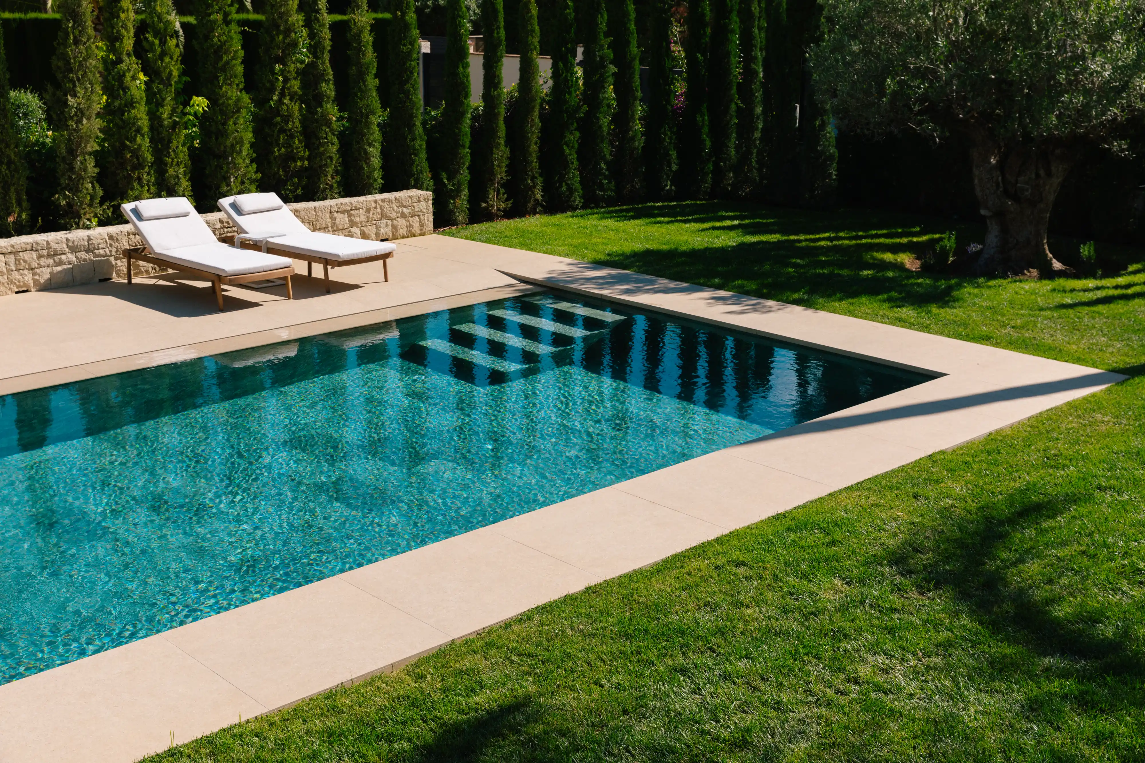 Outdoor terrace and pool area after rénovation de villa in Campolivar Valence image 77