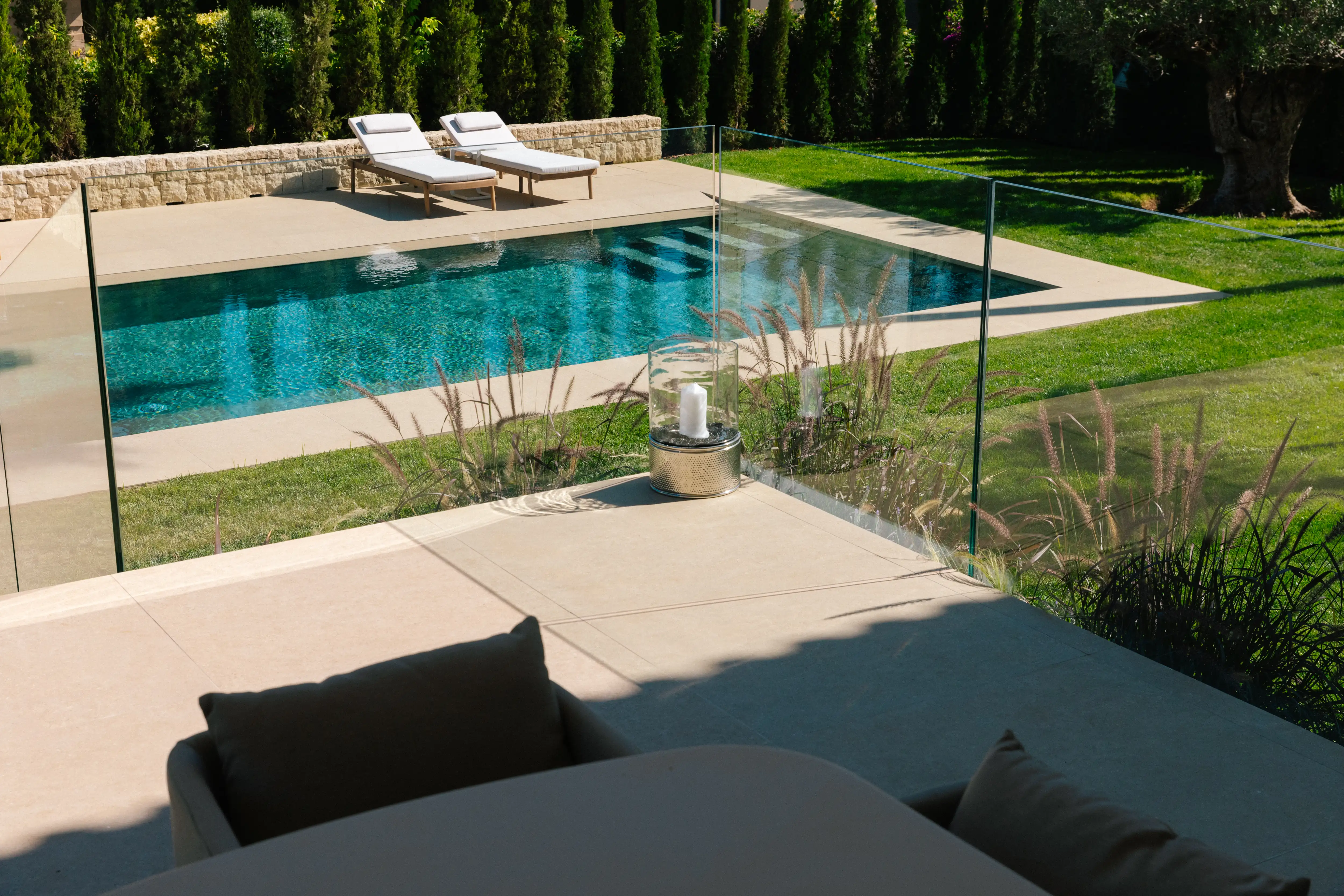 Outdoor terrace and pool area after rénovation de villa in Campolivar Valence image 81