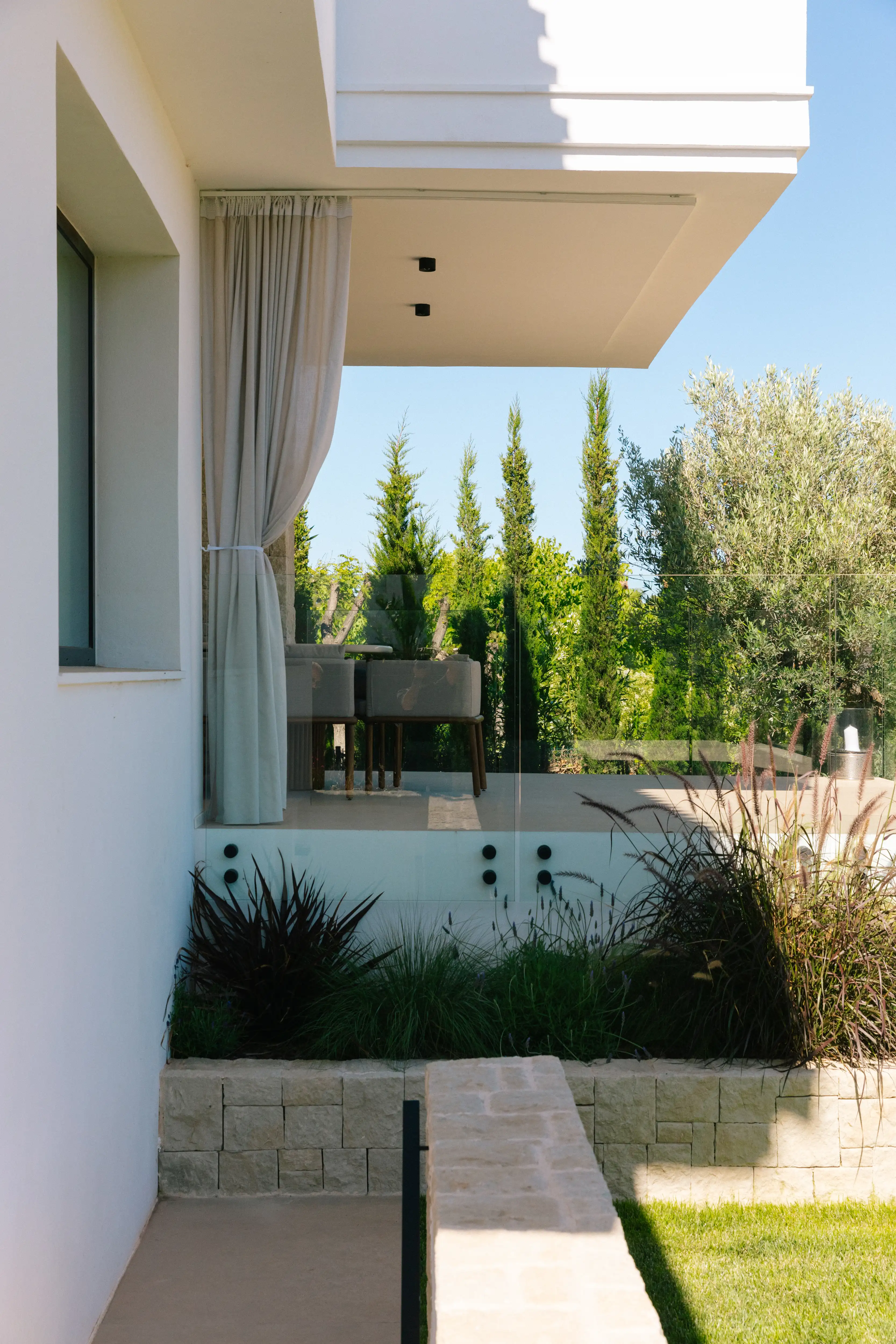 Outdoor terrace and pool area after rénovation de villa in Campolivar Valence image 83