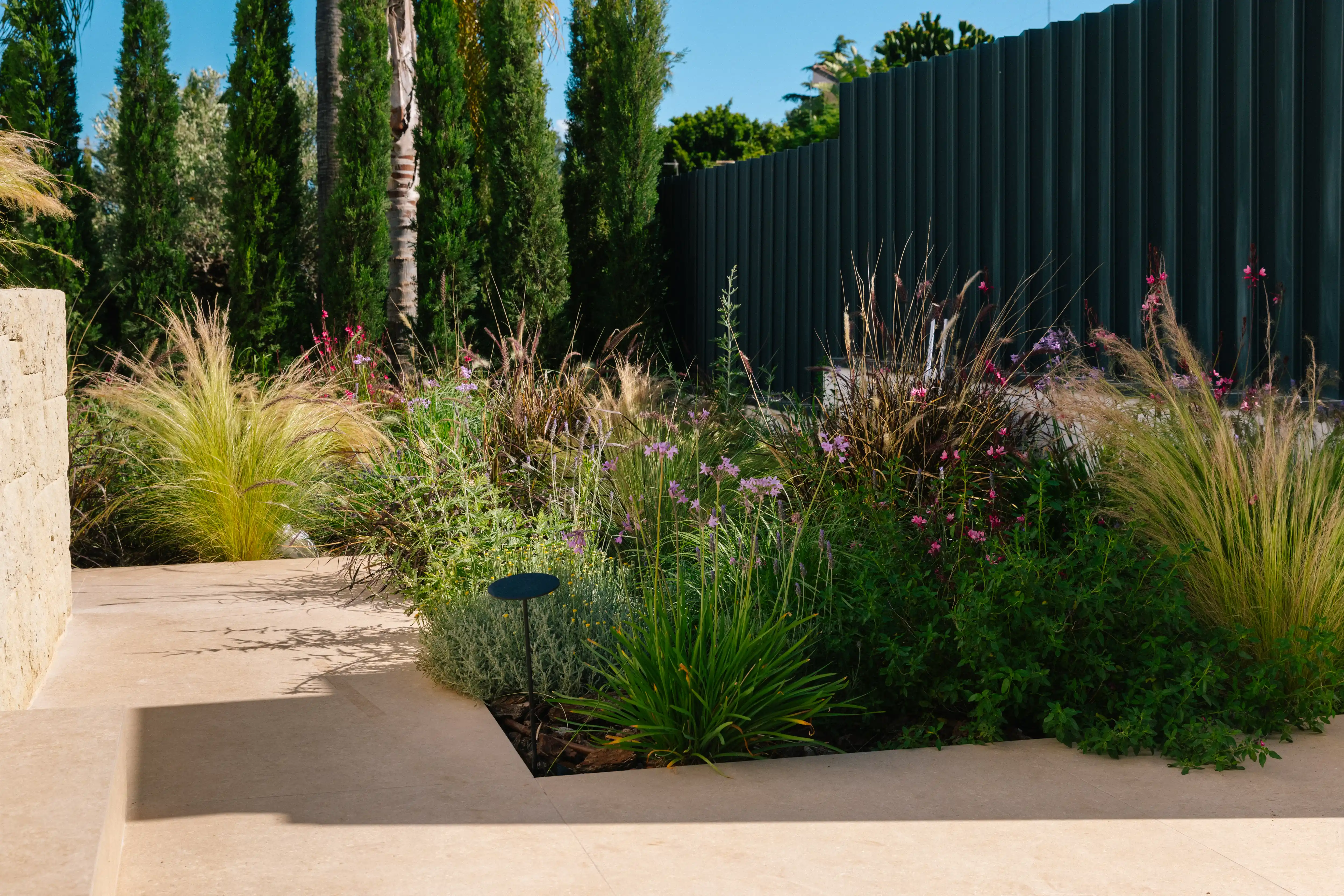 Outdoor terrace and pool area after rénovation de villa in Campolivar Valence image 84