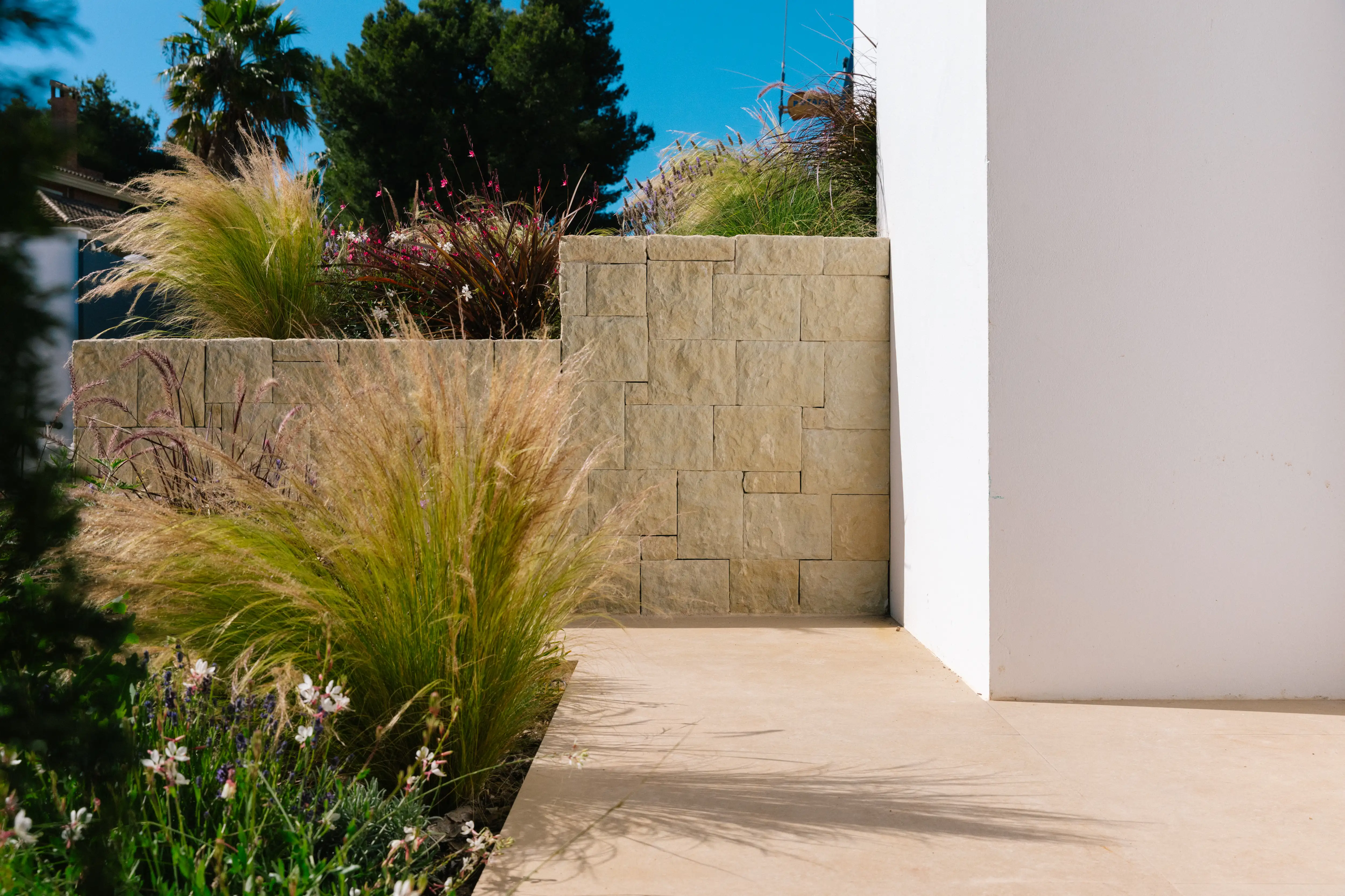Outdoor terrace and pool area after rénovation de villa in Campolivar Valence image 85